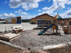 a playground with a slide and a slideintend at Bantlehof in Niedereschach