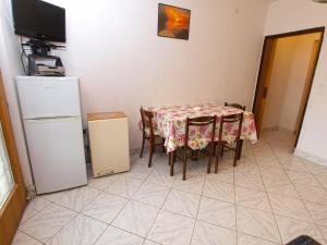 Kuchyňa alebo kuchynka v ubytovaní Apartments Evelina 1057