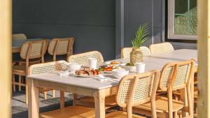 a table with a plate of food on it at Gapyeong Santa Maria Dog-friendly Privat in Gapyeong