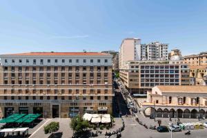 an aerial view of a city with buildings at Municipio Luxury Suite in Naples