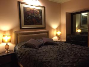 A bed or beds in a room at Athens Lycabettus Hill Penthouse, Private Roof Garden & Pool