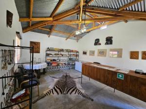 a room with a zebra rug on the floor at BKZ Self-Catering in Solitaire