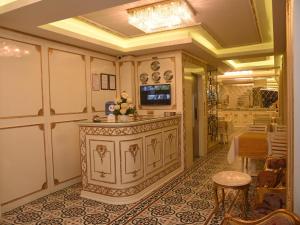 TV a/nebo společenská místnost v ubytování Best Town Hotel