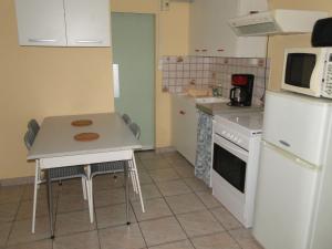 Køkken eller tekøkken på Gîte Debussy