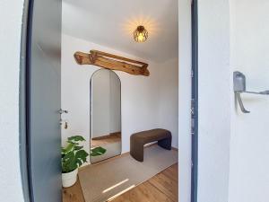 a bathroom with a mirror and a sink at Maison 8 pers rénovée nature, calme, proche Vosges in Colroy-la-Roche