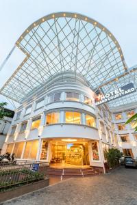 a large building with a glass roof at Hotel Grand Courtyard Pala in Pala