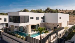 an aerial view of a house with a swimming pool at Villa Perla Vir in Vir