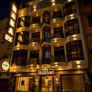 a large building with a baraka sign in front of it at Hotel Baba Deluxe near New Delhi Railway Station and City Center -By RCG Hotels in New Delhi