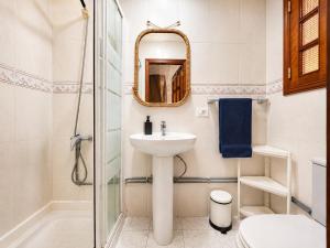 a bathroom with a sink and a shower at Kite & Surf Nomad House in Las Palmas de Gran Canaria +61 photos
