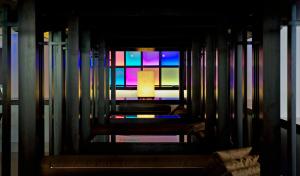a room with a stained glass window and a chair at SOL by Meliá Guadalupe in Magaluf +29 photos