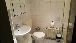 Ένα μπάνιο στο Gemütliches Apartment direkt am Strand +21 φωτογραφίες