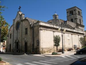 an old church with a cross on top of it at La Dimora del Colle in Mottola +3 photos