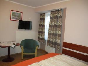 Łóżko lub łóżka w pokoju w obiekcie Hotel Pod Platanami