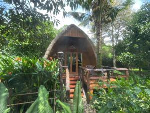 a small cabin in the middle of a forest at Bamboo Eco Village in Can Tho