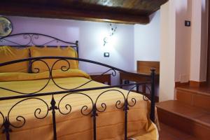 Letto o letti in una camera di B&B Salotto Di Athena
