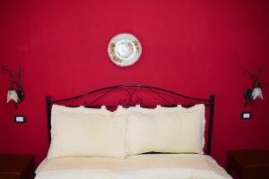 Letto o letti in una camera di B&B Salotto Di Athena