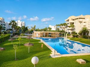 an image of a swimming pool at a resort at Viviendas El Tiburón in Almerimar