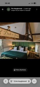 a screenshot of a hotel room with a bed at The Haughmond in Upton Magna +10 photos