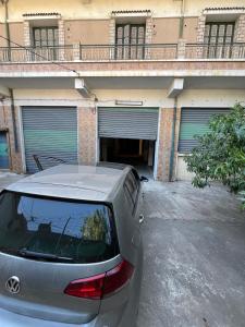 a car parked in front of a garage at Residence wafa 1 in Jijel