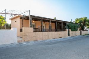 a building on the side of a street at Christiana's sweet house in Kos