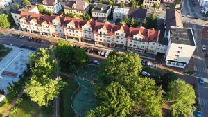 an overhead view of a city with buildings and trees at Apartament Biłgorajski przy Rynku in Biłgoraj