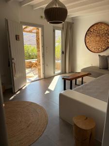 a bedroom with a bed and a room with a table at Santa Maria Hotel in Elia Beach +116 photos