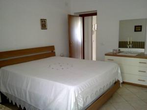 Posteľ alebo postele v izbe v ubytovaní Casa Michelangelo