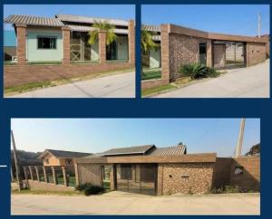 two pictures of a house in two different views at Casa familiar in Piên