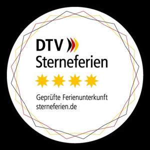 a logo for the dvrw generationseder istg istg at Ferienhaus Dat Landhuus 95158 in Rhauderfehn +41 photos