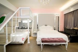Кровать или кровати в номере Ai Lian Shan Shui Homestay
