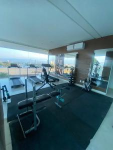 a gym with cardio equipment in a building at Studio 404 Premium Flat - Juazeiro do Norte - Cariri in Juazeiro do Norte