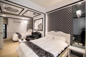 Кровать или кровати в номере Ai Lian Shan Shui Homestay