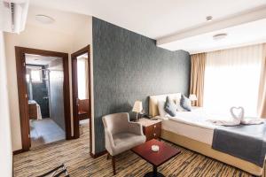 Postel nebo postele na pokoji v ubytování Port View Hotel