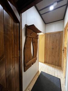 a room with a horse head on the wall at J&K Apartments in Brocēni