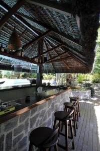 Een restaurant of ander eetgelegenheid bij Sombra e Água Fresca Resort