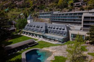an aerial view of a hotel with a swimming pool at Andorra Park Hotel in Andorra la Vella