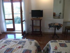 Postel nebo postele na pokoji v ubytování B&B La Principessa