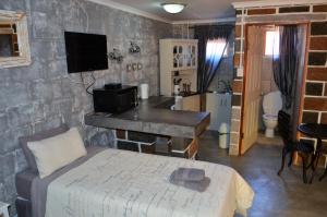 Telewizja i/lub zestaw kina domowego w obiekcie Art Guest House