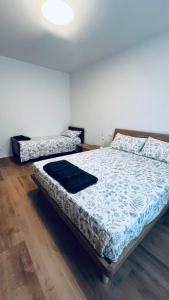 a bedroom with two beds in a room at A lì dai Nûtis in Venzone +7 photos