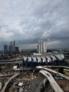 an overhead view of a city with a train station at Kingston Hotel 21 - JO Hotel Johor Bahru in Johor Bahru
