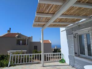 a view from the balcony of a house at Theros House in Ioulis