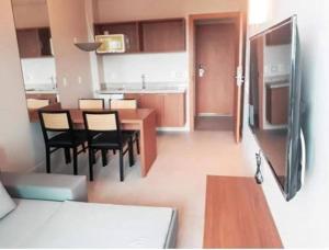 a kitchen and dining room with a table and chairs at Salinas Exclusive Resort in Salinópolis