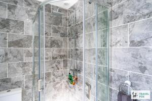 an overhead view of a shower in a bathroom at Springfield House in Cheadle +51 photos