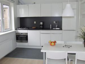 Cuisine ou kitchenette dans l'établissement De Viool