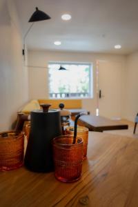 a group of baskets sitting on top of a wooden table at Arkouda House in Big Bear Lake +48 photos