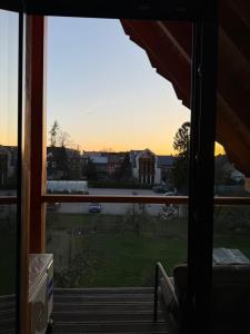 a view from a window with a view of a building at OrkanaApart in Nowy Targ