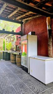 a refrigerator sitting on the side of a building at Lodi House in Godoy Cruz