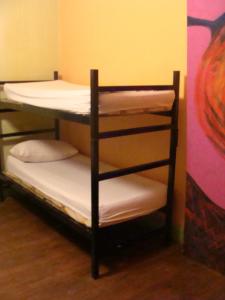 Divstāvu gulta vai divstāvu gultas numurā naktsmītnē Intiaconcagua Habitaciones Familiares