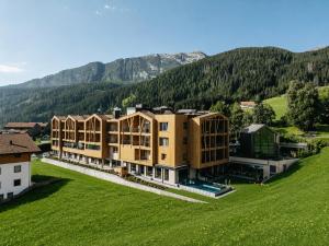 an aerial view of a resort in the mountains at Erlebnisort Gassenhof in Ridanna