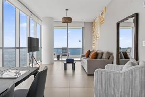 a living room with a view of the ocean at Ocean 2 Sky at Monte Carlo Miami Beach in Miami Beach
